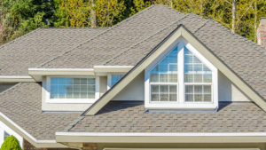 Close up view of an asphalt shingle roof on a home